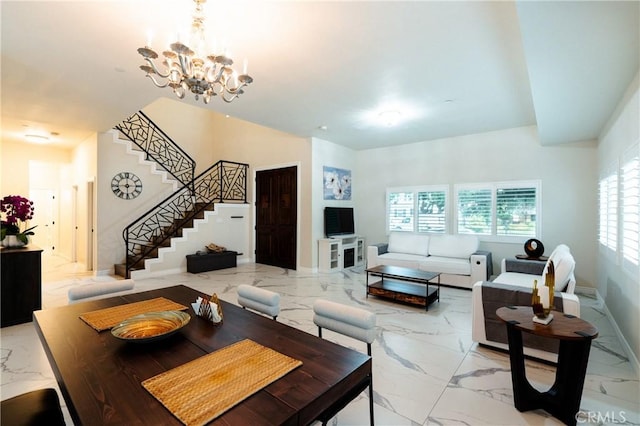 139 E Puente St, Covina, CA 91723 - living room with light marble finish flooring, stairs, a chandelier, and baseboards