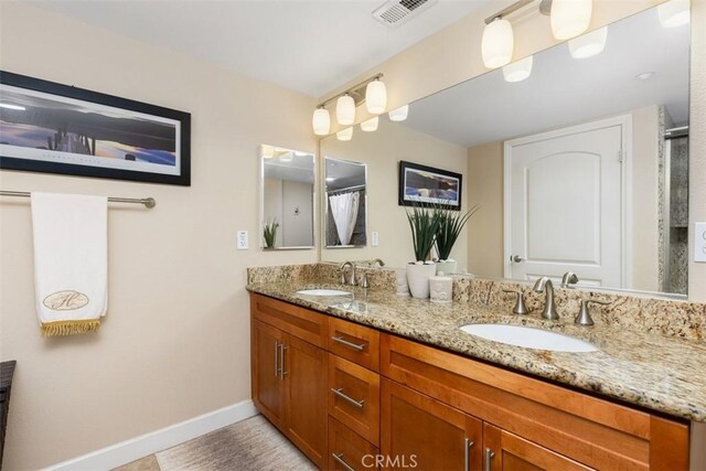 1021 Costa Pacifica Way Unit 2105, Oceanside, CA 92054 - full bath featuring double vanity and a shower with curtain