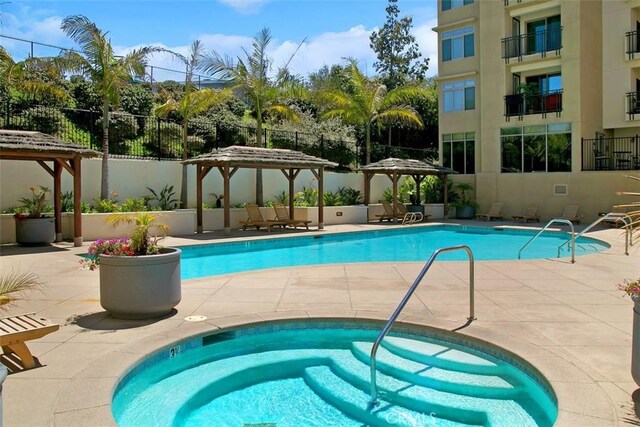 1021 Costa Pacifica Way Unit 2105, Oceanside, CA 92054 - community pool featuring a gazebo, a community hot tub, and a patio