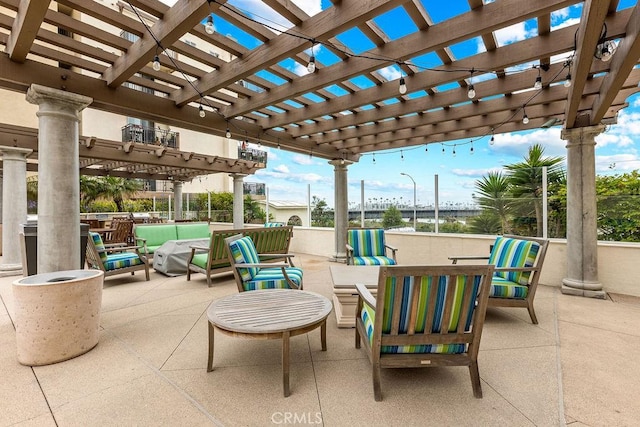1021 Costa Pacifica Way Unit 2105, Oceanside, CA 92054 - view of patio with an outdoor living space and a pergola