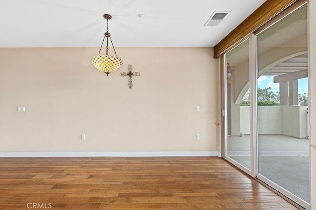 1021 Costa Pacifica Way Unit 2105, Oceanside, CA 92054 - spare room with light wood-style floors and arched walkways