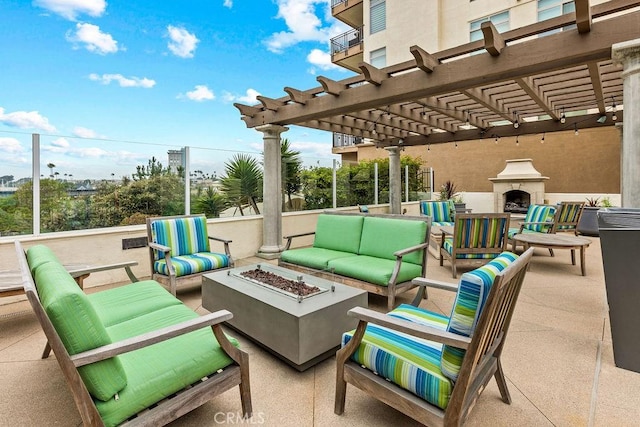 1021 Costa Pacifica Way Unit 2105, Oceanside, CA 92054 - view of patio / terrace featuring an outdoor living space with a fireplace and a pergola