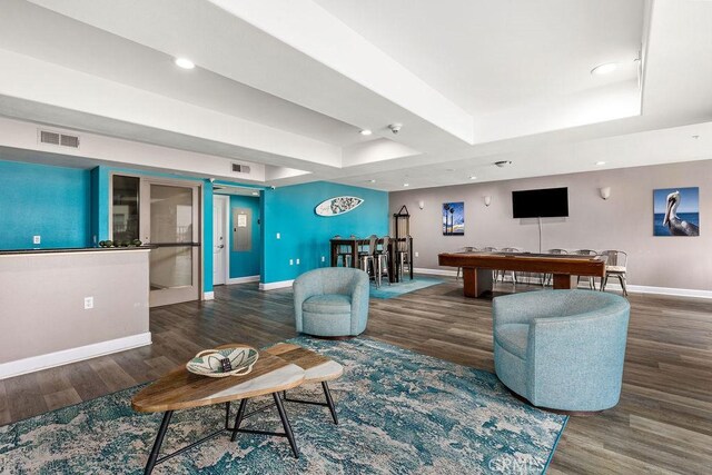 1021 Costa Pacifica Way Unit 2105, Oceanside, CA 92054 - living room featuring a raised ceiling, wood finished floors, and recessed lighting