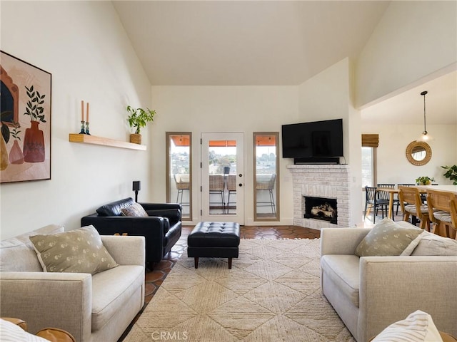 535 E Walnut Ave Unit A, El Segundo, CA 90245 - living area with high vaulted ceiling and a fireplace