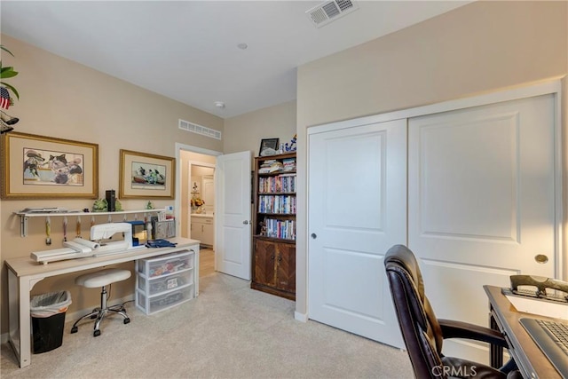 office space featuring light carpet and visible vents