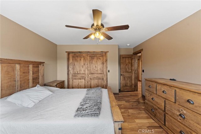1985 Golden Rod Ave, Big Bear City, CA 92314 - bedroom featuring light wood-style floors and a ceiling fan