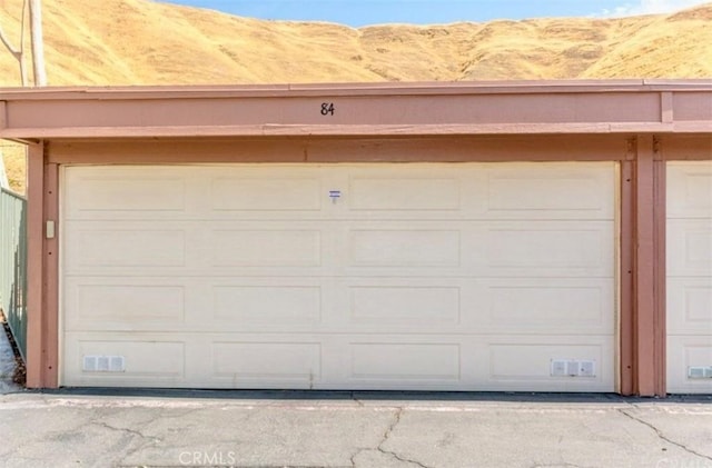 garage featuring a mountain view