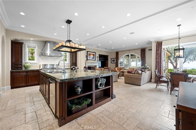 28 Surfspray Blf, Newport Coast, CA 92657 - kitchen with stone tile flooring, wall chimney range hood, crown molding, recessed lighting, and open shelves