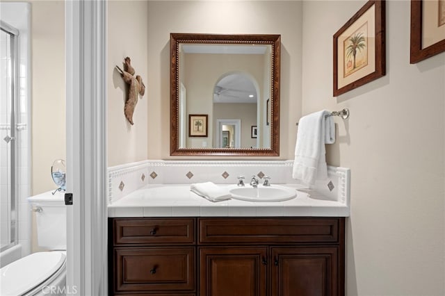 28 Surfspray Blf, Newport Coast, CA 92657 - bathroom with vanity and bath / shower combo with glass door