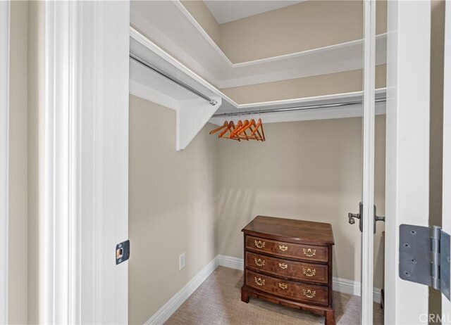 28 Surfspray Blf, Newport Coast, CA 92657 - walk in closet with carpet flooring