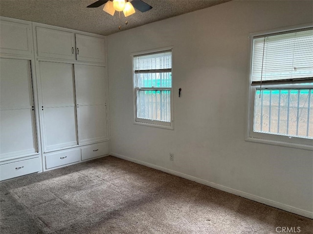 2223 W Olympic Blvd, Montebello, CA 90640 - unfurnished bedroom with carpet, a closet, a ceiling fan, and baseboards