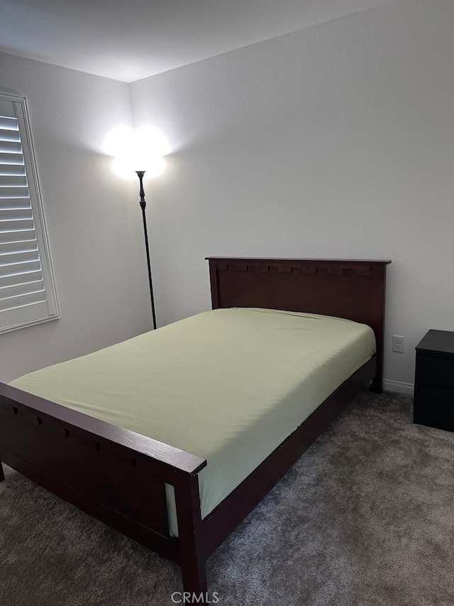 bedroom featuring carpet