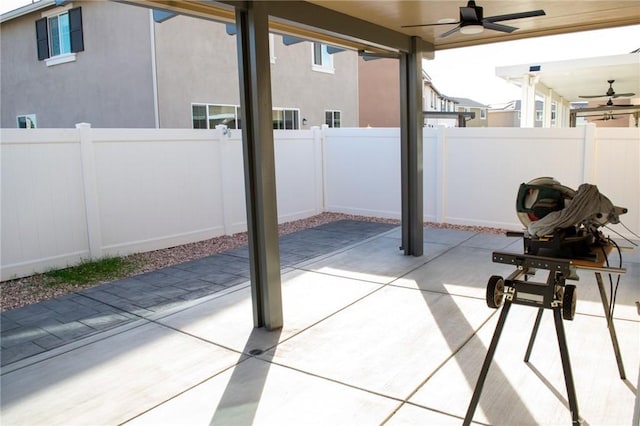 view of patio with a ceiling fan and a fenced backyard
