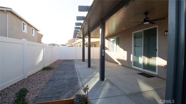 view of patio / terrace with a ceiling fan and a fenced backyard
