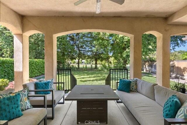 view of patio / terrace featuring an outdoor hangout area, ceiling fan, and a fenced backyard