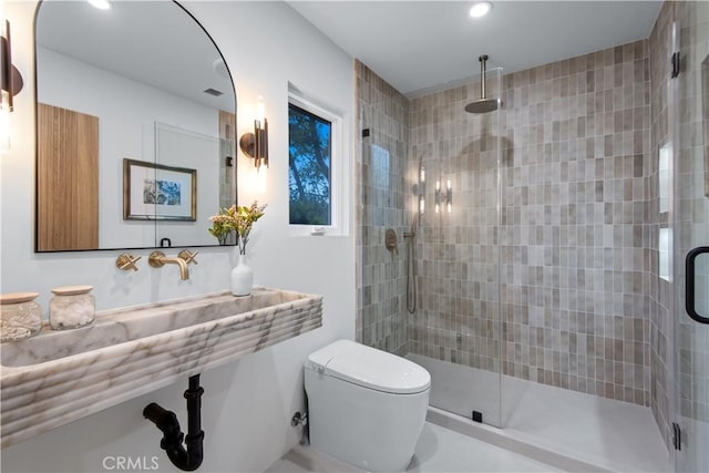 bathroom featuring a stall shower, visible vents, toilet, and recessed lighting