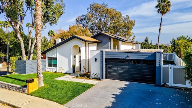 32772 Shipside Dr, Dana Point, CA 92629 - mid-century inspired home featuring driveway, stucco siding, a gate, and a garage