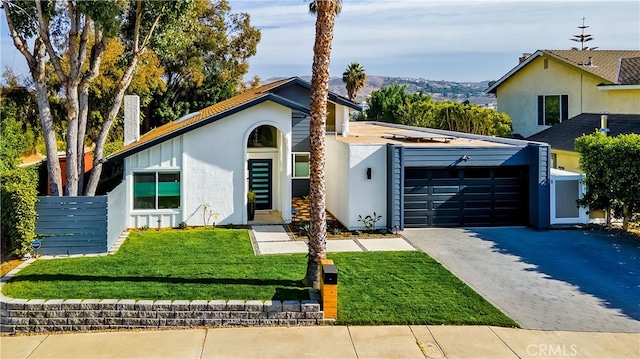 32772 Shipside Dr, Dana Point, CA 92629 - view of front of house with an attached garage, decorative driveway, and stucco siding