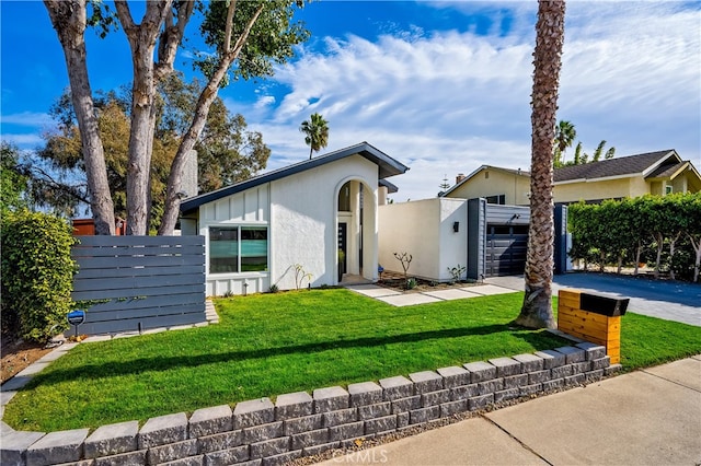 32772 Shipside Dr, Dana Point, CA 92629 - mid-century modern home with stucco siding, an attached garage, and driveway