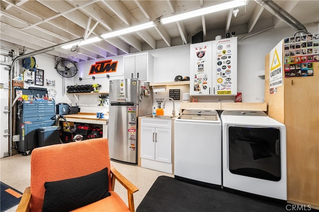 32772 Shipside Dr, Dana Point, CA 92629 - washroom with a workshop area and separate washer and dryer