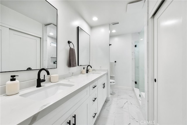 32772 Shipside Dr, Dana Point, CA 92629 - bathroom with marble finish floors, toilet, recessed lighting, a marble finish shower, and double vanity