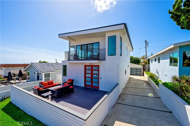 33781 Copper Lantern St, Dana Point, CA 92629 - rear view of property with stucco siding, fence, a deck, a balcony, and an outdoor hangout area