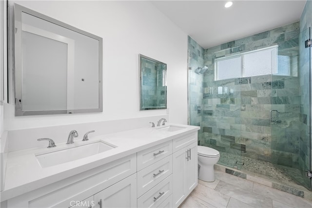 33781 Copper Lantern St, Dana Point, CA 92629 - bathroom featuring a stall shower, toilet, a sink, and double vanity