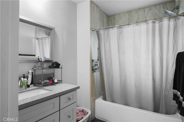 full bath with shower / bath combo with shower curtain and vanity