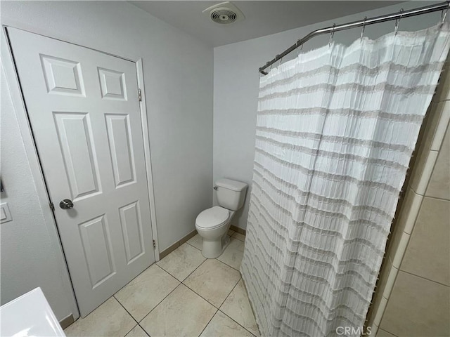 14802 Newport Unit 2B, Tustin, CA 92780 - full bathroom featuring tile patterned floors and a shower with curtain