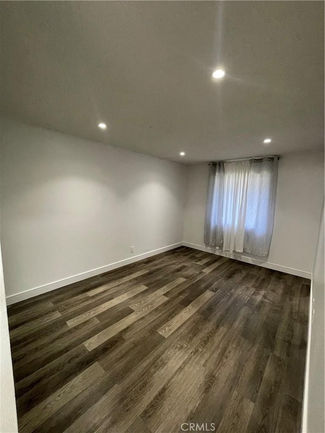 14802 Newport Unit 2B, Tustin, CA 92780 - unfurnished room featuring recessed lighting and dark wood-type flooring