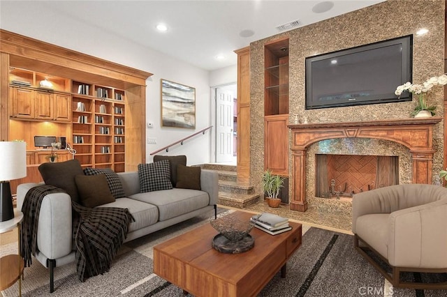 living room with visible vents and recessed lighting
