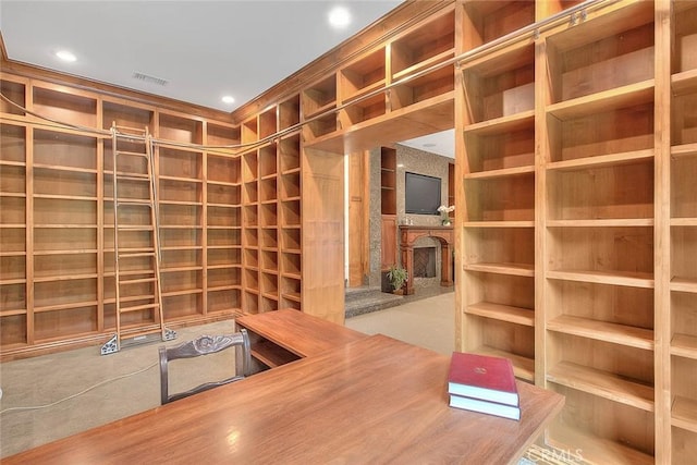 wine room with recessed lighting, visible vents, and a fireplace