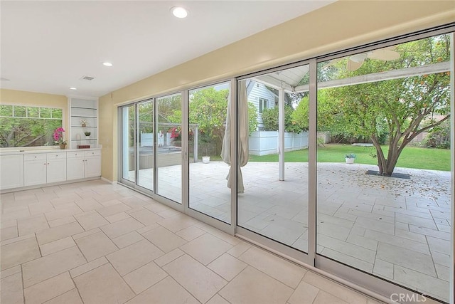 entryway with visible vents, recessed lighting, and light tile patterned floors