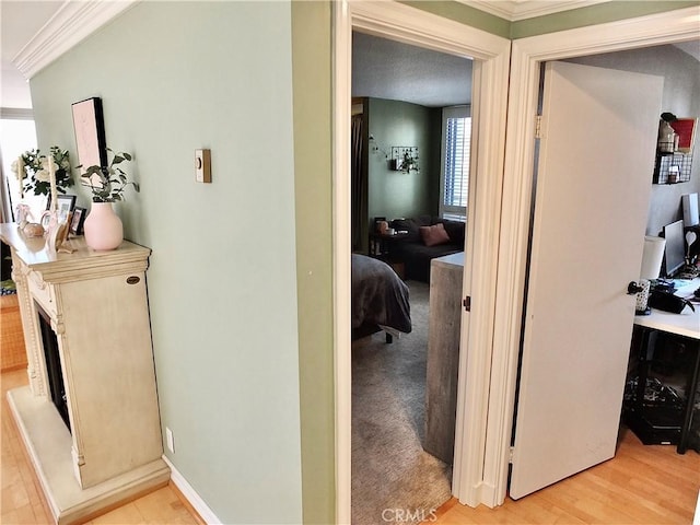 2601 E Ocean Blvd Unit 205, Long Beach, CA 90803 - hall with ornamental molding and light wood-type flooring