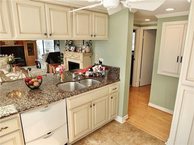 2601 E Ocean Blvd Unit 205, Long Beach, CA 90803 - kitchen with a sink, cream cabinets, ceiling fan, crown molding, and white dishwasher