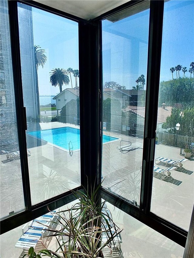 2601 E Ocean Blvd Unit 205, Long Beach, CA 90803 - entryway featuring healthy amount of natural light and a wall of windows