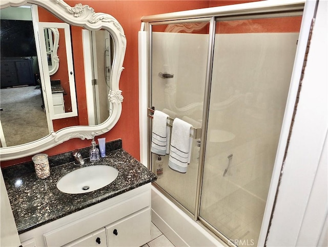 2601 E Ocean Blvd Unit 205, Long Beach, CA 90803 - full bathroom featuring vanity, shower / bath combination with glass door, and tile patterned flooring