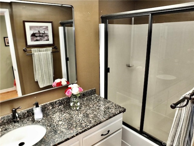 2601 E Ocean Blvd Unit 205, Long Beach, CA 90803 - bathroom with vanity and shower / bath combination with glass door