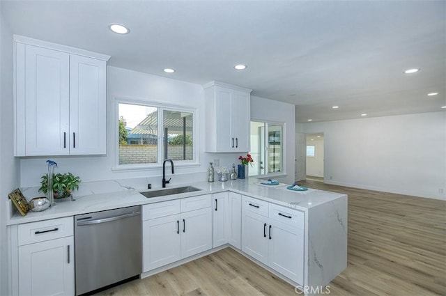 3518 Faust Ave, Long Beach, CA 90808 - kitchen featuring stainless steel dishwasher, light stone counters, light wood-style flooring, recessed lighting, and white cabinetry