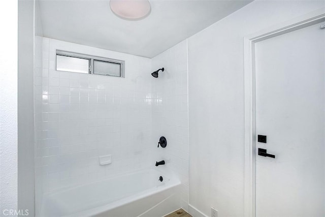 bathroom with shower / bathing tub combination