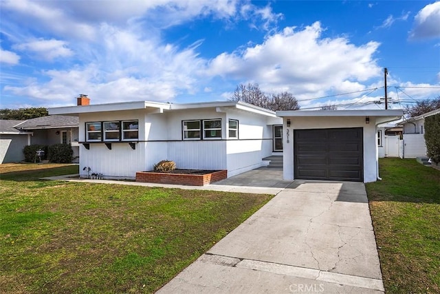 3518 Faust Ave, Long Beach, CA 90808 - ranch-style house with a garage, a front lawn, driveway, and a chimney