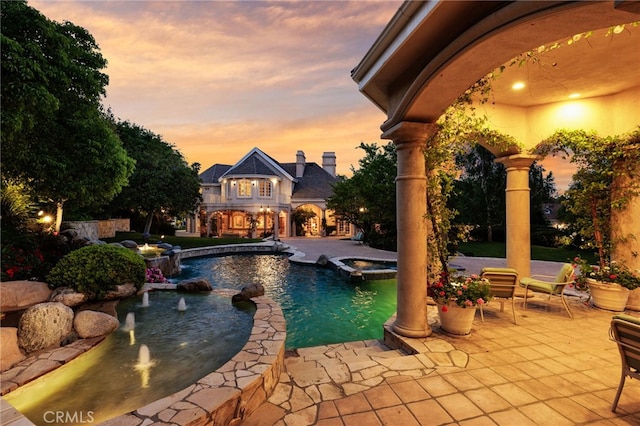 4537 Ellenboro Way, Woodland Hills, CA 91364 - view of pool featuring a patio area and a pool with connected hot tub