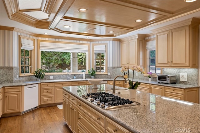 4537 Ellenboro Way, Woodland Hills, CA 91364 - kitchen with stainless steel gas cooktop, crown molding, light wood-style floors, decorative backsplash, and a sink