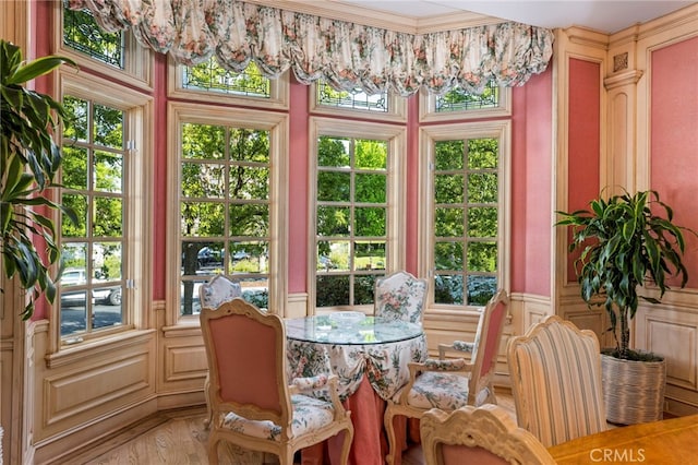 4537 Ellenboro Way, Woodland Hills, CA 91364 - sunroom featuring a decorative wall, wainscoting, and ornamental molding