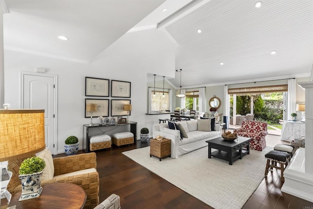 living room with dark wood-style floors, high vaulted ceiling, and recessed lighting