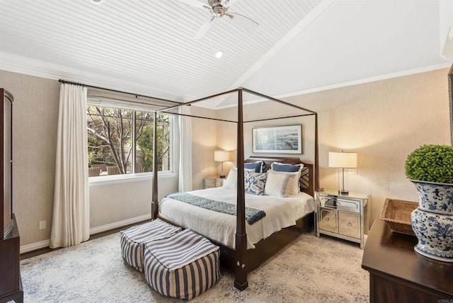 bedroom with baseboards, lofted ceiling, and crown molding