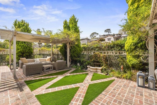view of yard featuring a fenced backyard, a pergola, outdoor lounge area, and a patio area