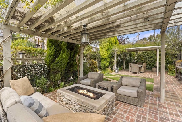 view of patio / terrace featuring an outdoor living space with a fire pit, fence, outdoor dining space, and a pergola