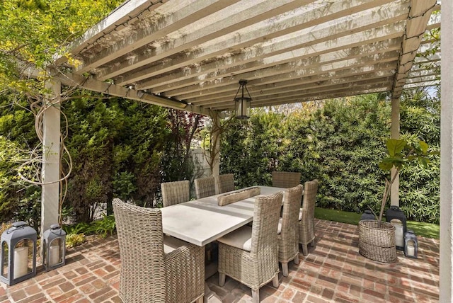 view of patio / terrace featuring outdoor dining space and a pergola