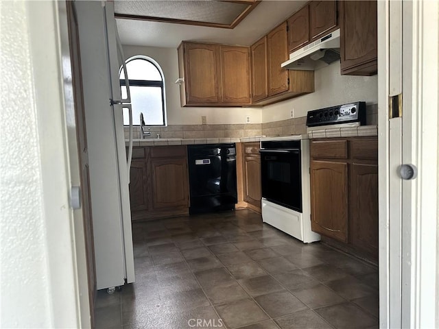 19238 Olive Way, Apple Valley, CA 92308 - kitchen featuring tile countertops, under cabinet range hood, dishwasher, and electric range oven